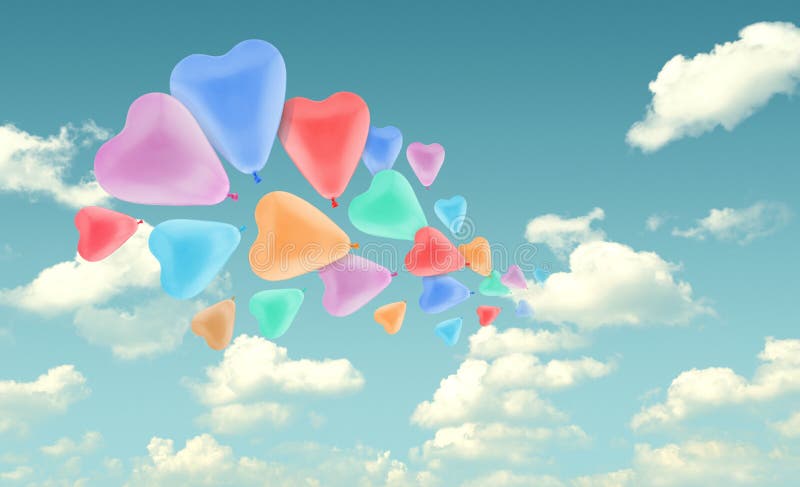Colorful love heart balloon on blue sky background, valentine co royalty free stock photography Colorful love heart balloon on blue sky background, valentine co royalty free stock photography
