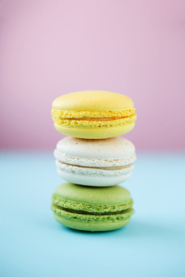 Colorful Macarons on Pink and Blue Background Stock Photo - Image of ...