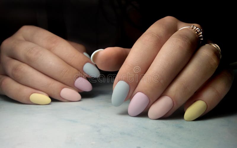 Colorful Manicure With Multi-colored Coating. Stock Image - Image of