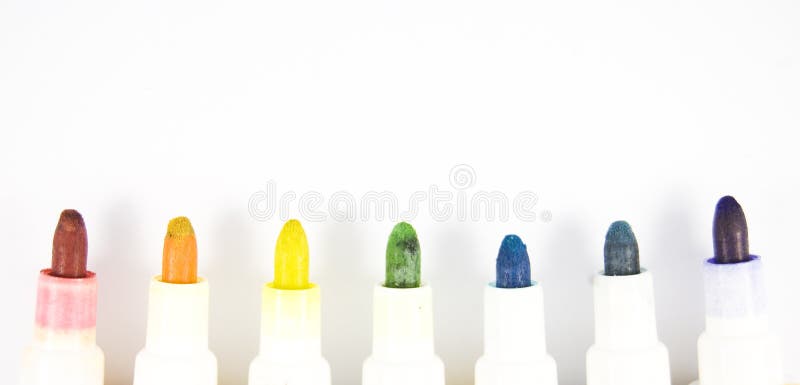 Colorful markers on white background isolated