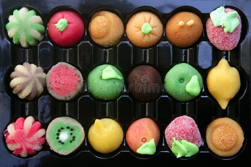 Colorful marzipan sweets with fruits shapes