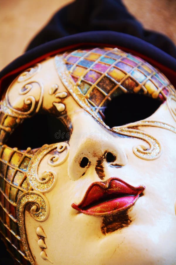 Colorful mask, detail, outdoors, in Venice, Italy stock photo Colorful mask, detail, outdoors, in Venice, Italy stock photo