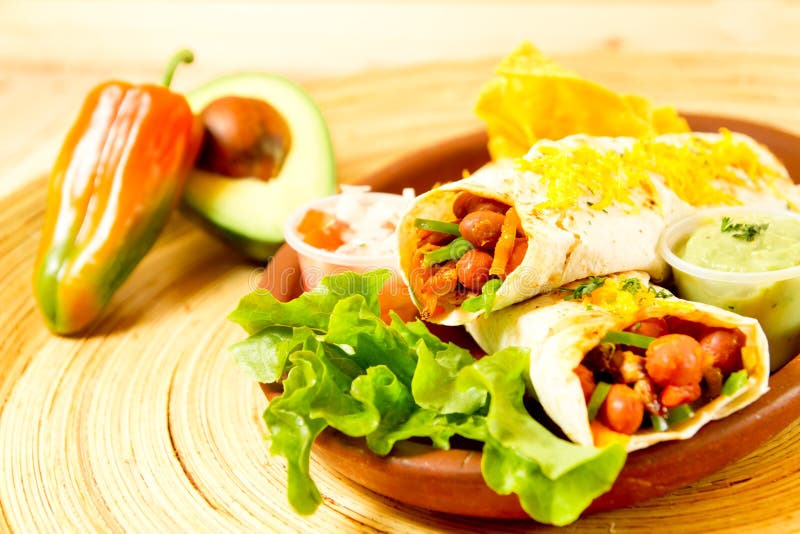 Colorful Mexican food plate with tacos