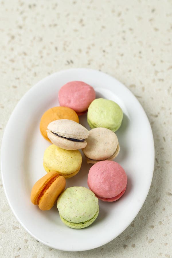 Colorful Mini Macaroon on White Plate Stock Photo - Image of colorful ...
