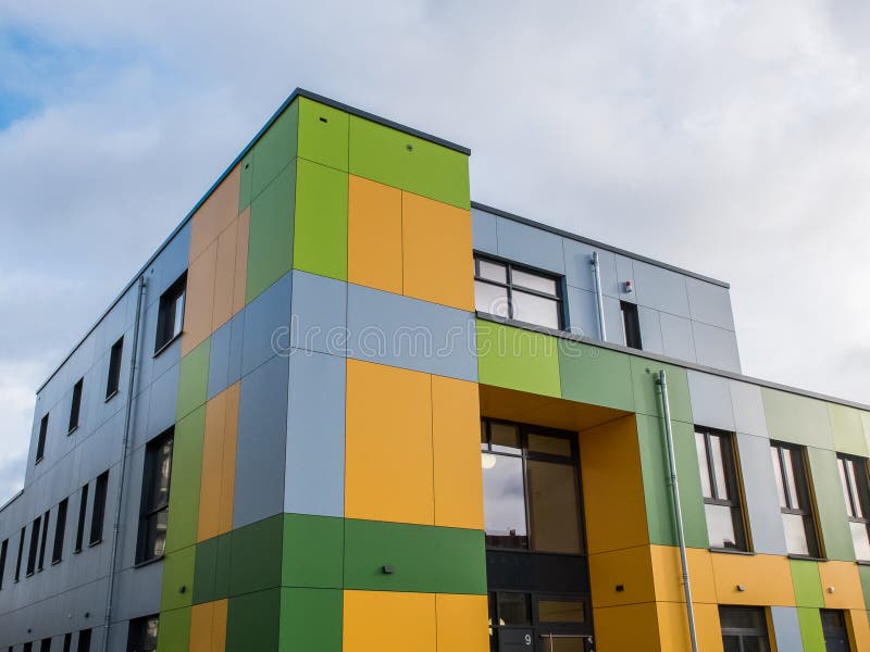 Colorful Modern Building Exterior with Cloudy Sky