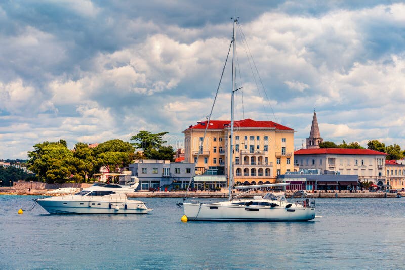Colorful morning cityscape of popular summer resort Porec. Bright spring seascape of Adriatic Sea. Great scene of Istrian Peninsu royalty free stock image Colorful morning cityscape of popular summer resort Porec. Bright spring seascape of Adriatic Sea. Great scene of Istrian Peninsu royalty free stock image