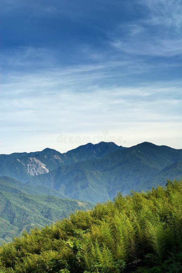 Here ard blue sky white clouds and green trees of mountain. Here ard blue sky white clouds and green trees of mountain.