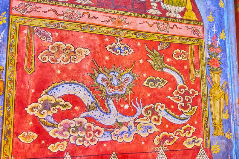 Colorful mural of the mythologial Naga serpent creature on the wall of Wat Bowonniwet Vihara, Bangkok, Thailand stock photos