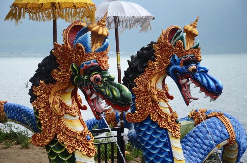 Colorful Naga or serpent statue fountain in front of Ulun Danu Bratan Temple royalty free stock images
