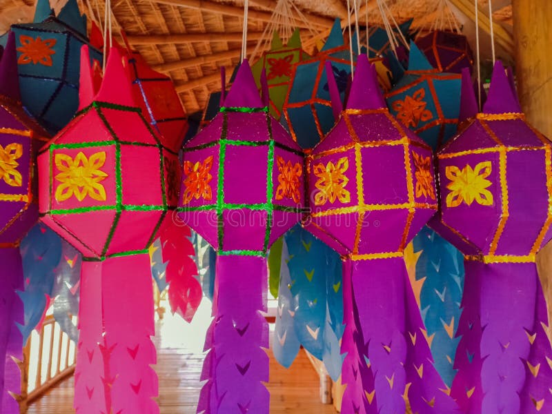 Colorful Northern of Thailand lamps hanging in bamboo hut. Handmade lamp made from paper. The symbol of festival of native people royalty free stock photos