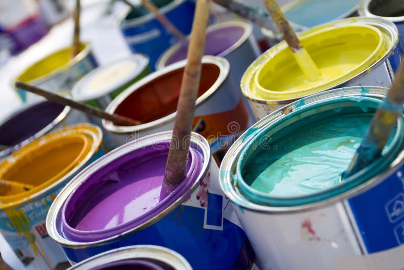 Colorful paint and brushes