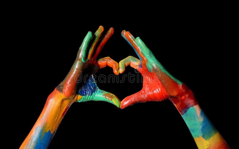 Colorful Painted Hands making heart shape love concept stock image Colorful Painted Hands making heart shape love concept stock image