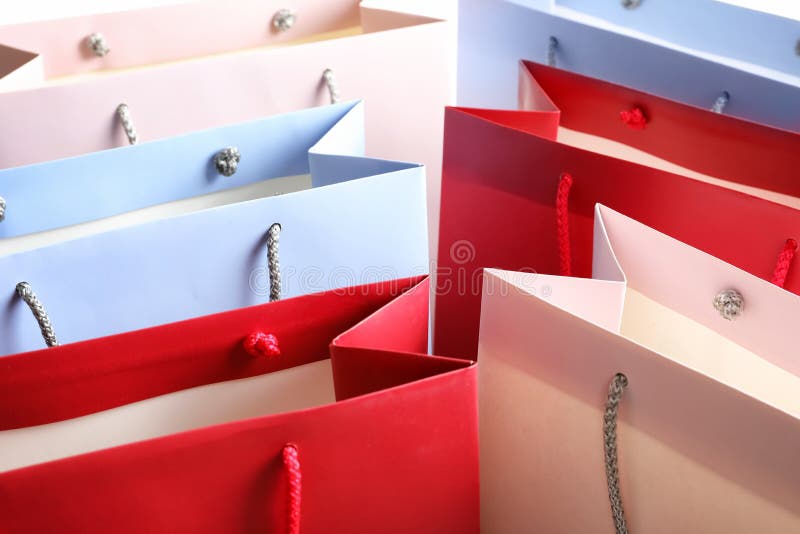 Colorful paper shopping bags as background