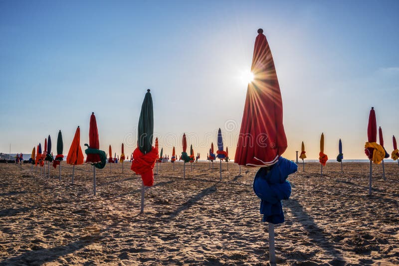 Colorful parasols on Deauville beach royalty free stock photography