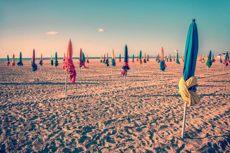 Colorful parasols on Deauville beach, France stock photos