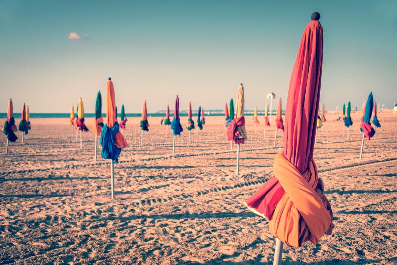Colorful parasols on Deauville beach, France stock photography
