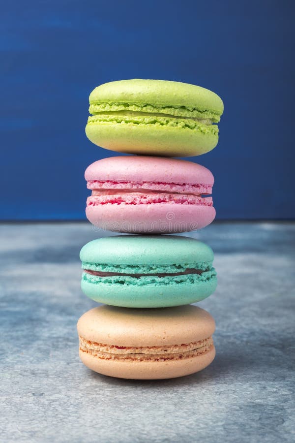 Colorful Pastry. Cookie Macaron Or Macaroon On A Dark Background. Stock ...