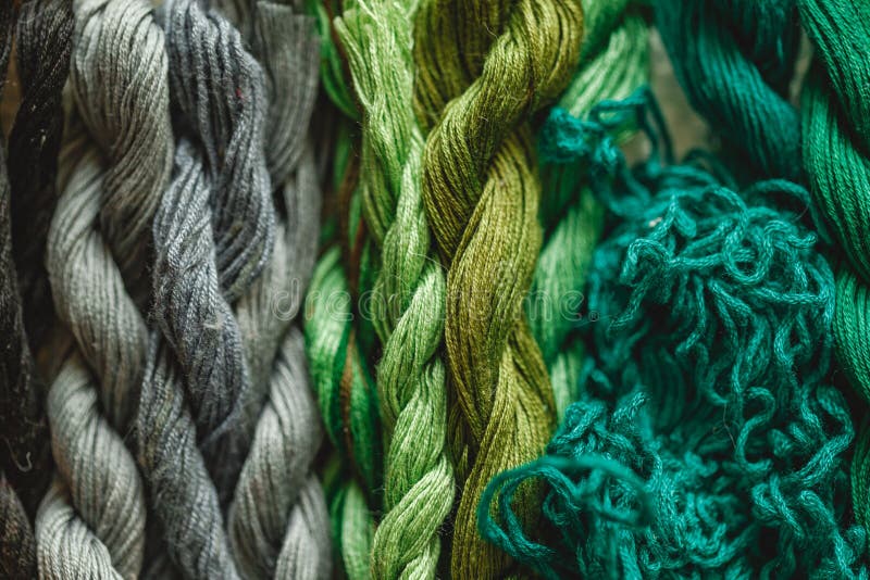 Colorful pattern background from embroidery thread stock photos