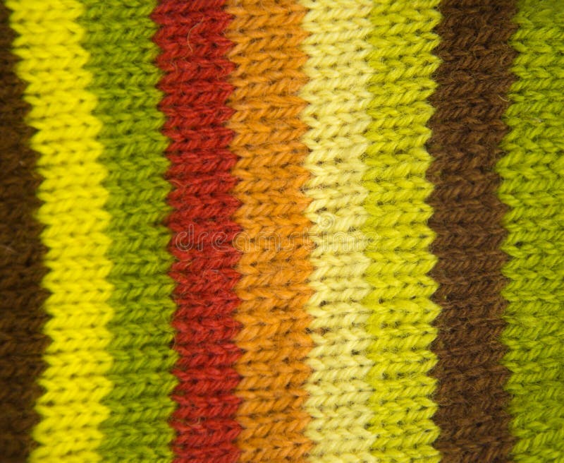 Colorful pattern ow a hand made wool socks. Natural clothing.