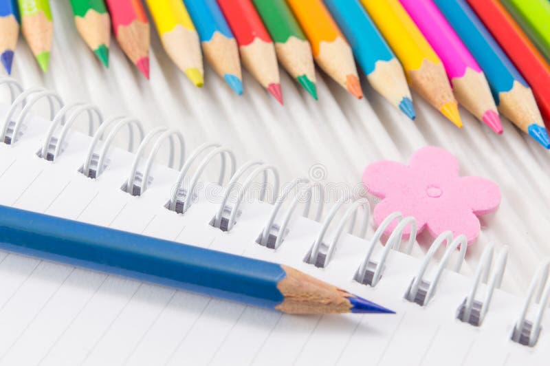 Colorful pencils with drawing and writing equipment