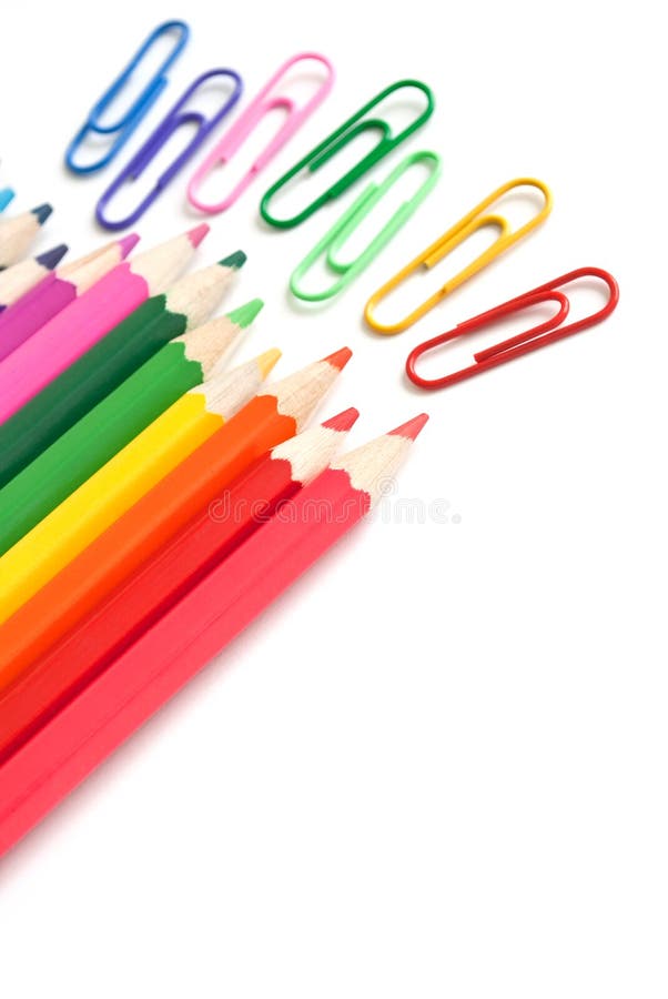 Colorful pencils and paperclips, office stationery