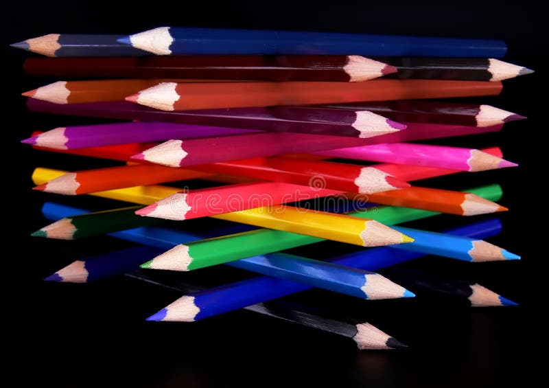 Colorful pencils tower top view