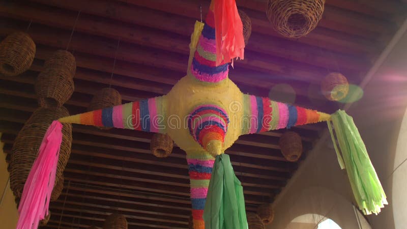 https://thumbs.dreamstime.com/b/colorful-pinata-handmade-lamps-hanging-ceiling-low-angle-view-star-shaped-wooden-smooth-striped-mexican-ornament-211768132.jpg