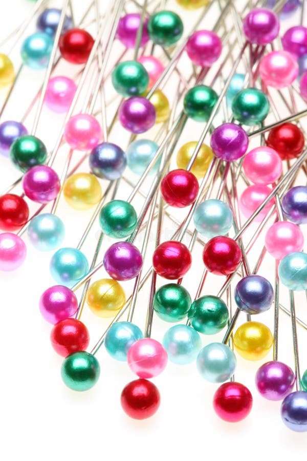 steel straight pins/push pins for sewing, in a box with multicolored  plastic ball heads. The extreme macro allows the ability to see the polish  and t Stock Photo - Alamy