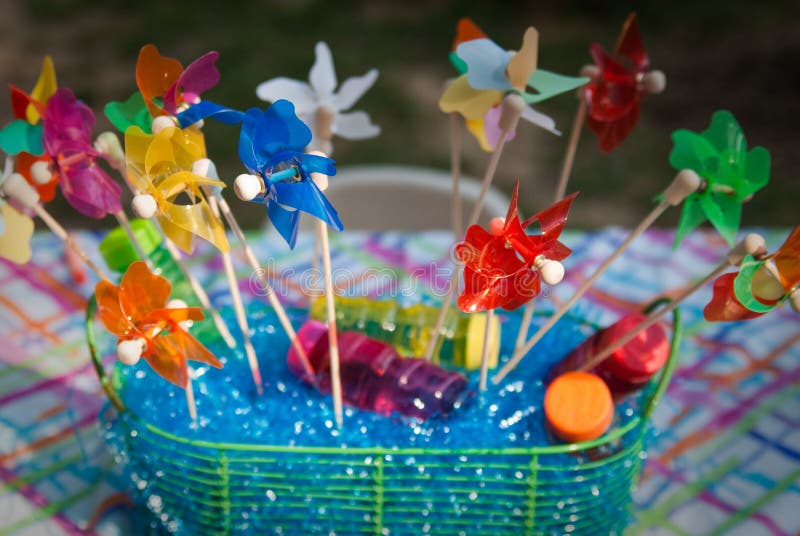 Colorful Pinwheels in a Basket stock images