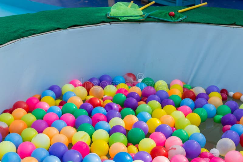 Colorful Plastic Ball Floating on Water in the Pool Stock Image Image