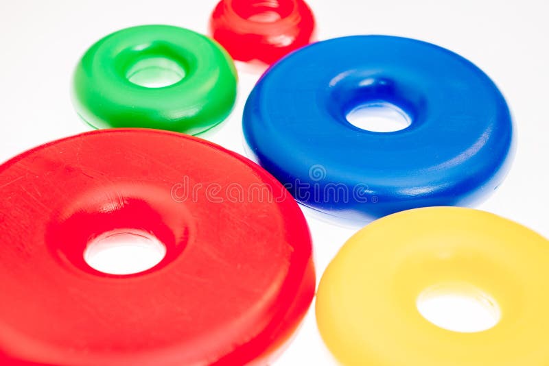 Colorful plastic toy rings stock photo. Image of education 29049542