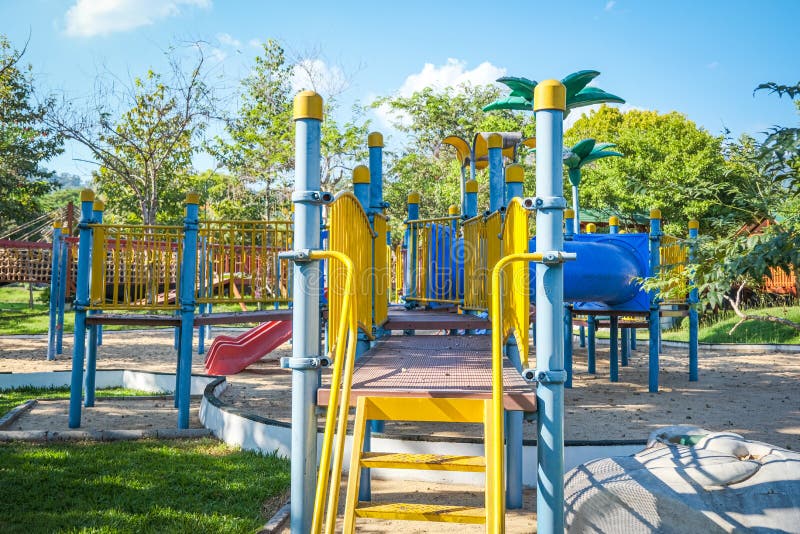 Colorful Playground On Yard In The Park Tunnel And Slider For Children