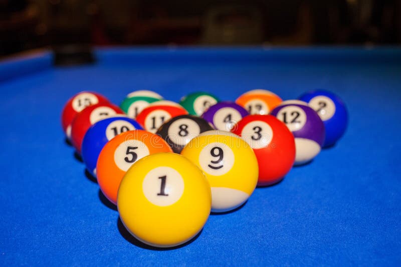 Colorful pool balls on billiard table stock image Colorful pool balls on billiard table stock image