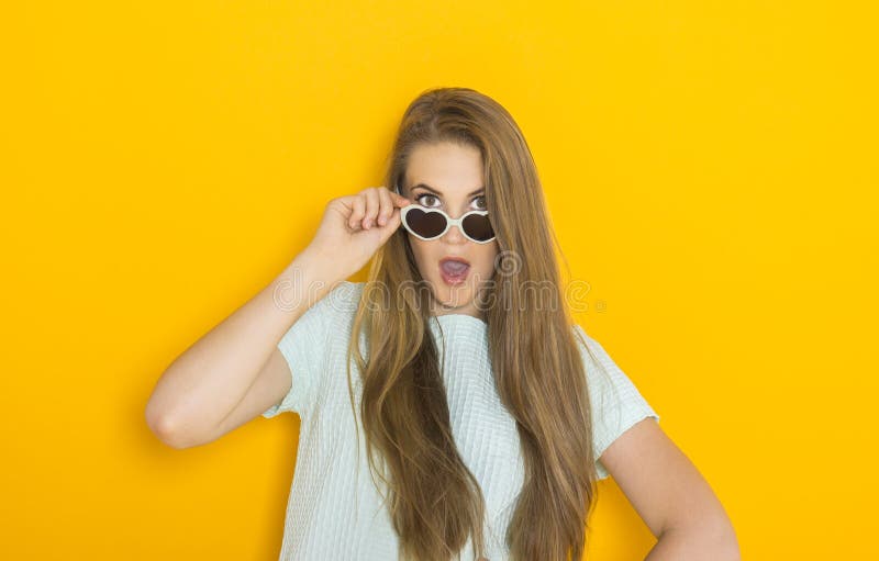 Colorful portrait of young attractive woman wearing sunglasses. Summer beauty concept