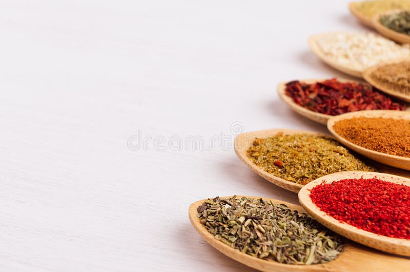 Colorful powder spices on white wooden board with copy space, closeup, texture. royalty free stock photos Colorful powder spices on white wooden board with copy space, closeup, texture. royalty free stock photos