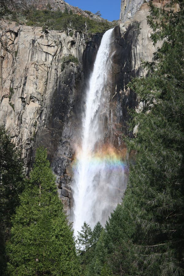 Colorful rainbow over Yosemite fall