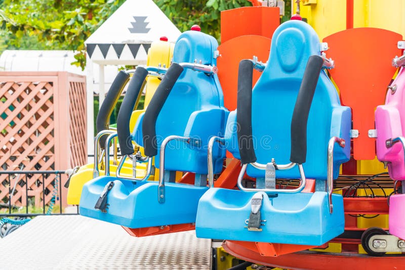 Colorful Roller Coaster Seats at Amusement Park Stock Image - Image of ...