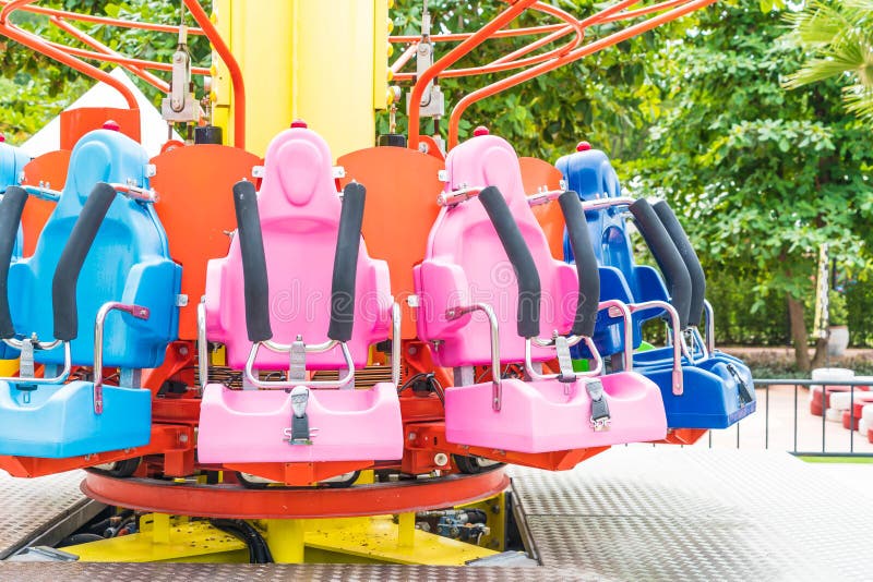 Colorful Roller Coaster Seats at Amusement Park Stock Photo - Image of ...