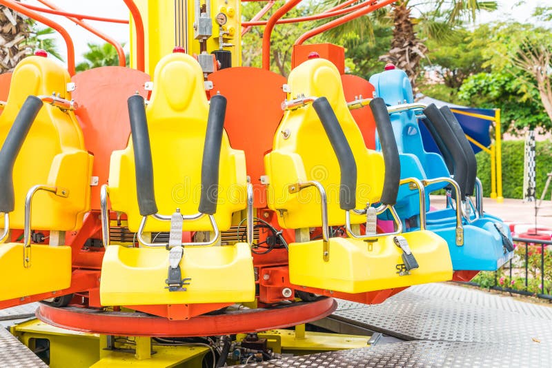 Colorful Roller Coaster Seats at Amusement Park Stock Image - Image of ...