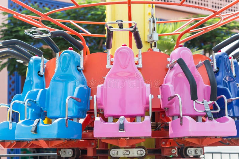 Colorful Roller Coaster Seats at Amusement Park Stock Image - Image of ...