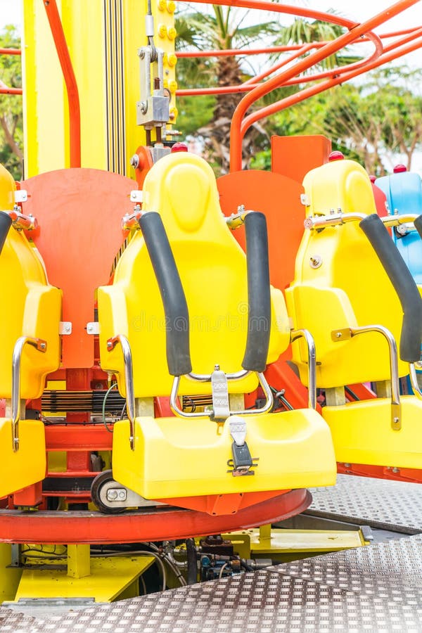 Colorful Roller Coaster Seats at Amusement Park Stock Image - Image of ...