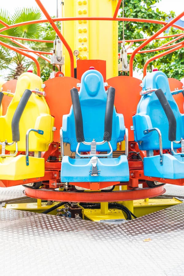 Colorful Roller Coaster Seats At Amusement Park Stock Image - Image of ...