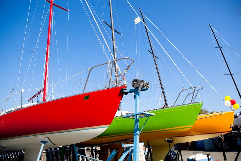 Colorful Sailboats in Dry Dock