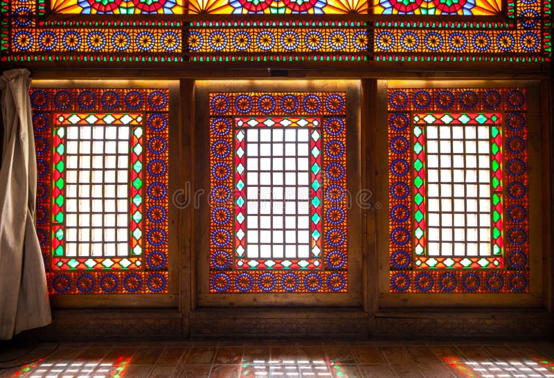 Colorful sash windows in the Arg-e Karim Khan. Shiraz, Iran