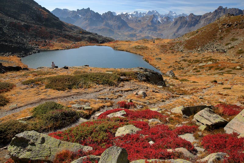 Colorful scenery in Autumn with the Serpent lake, located in Vallee de la Claree Claree Valley above Nevache village royalty free stock photography.