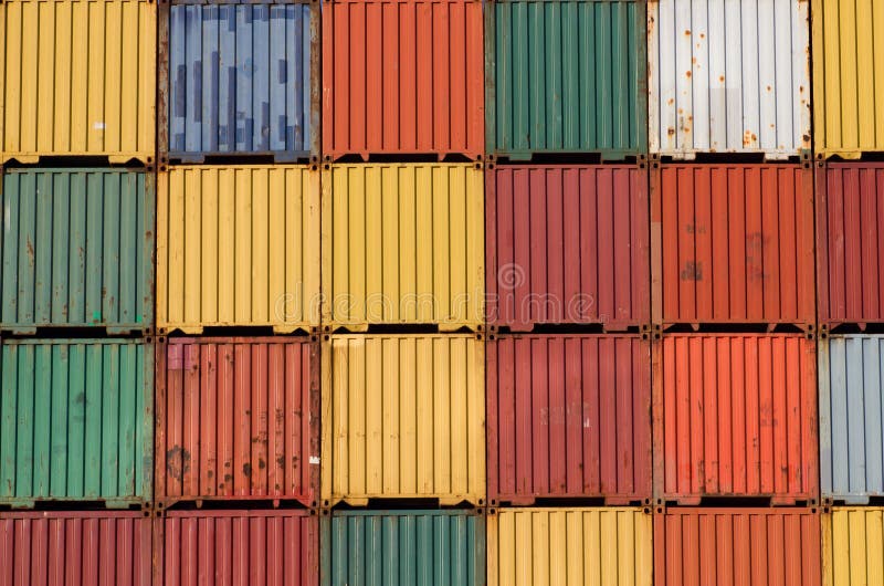 Colorful ship cargo containers stacked up in a port. Colorful ship cargo containers stacked up in a port.