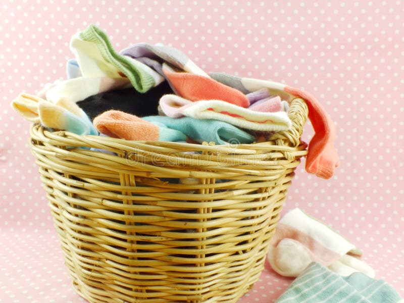 Socks in laundry basket stock photo. Image of handles 21466178