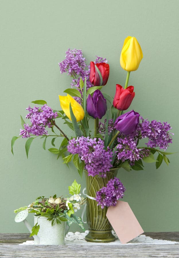 Colorful Spring Tulips and Lilac in a Vase