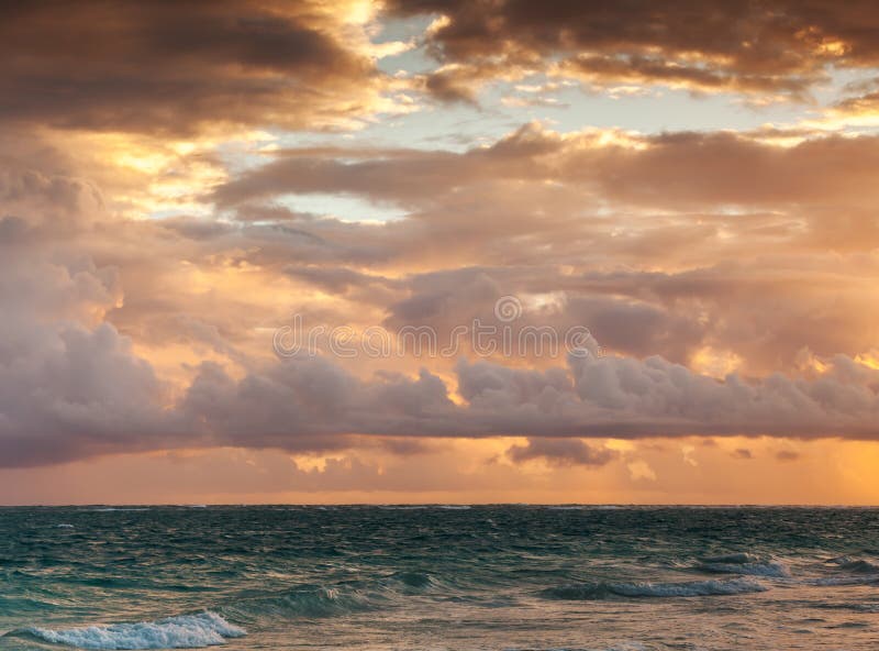 Colorful sunrise sky over Atlantic ocean. Dominican republic, Punta Cana