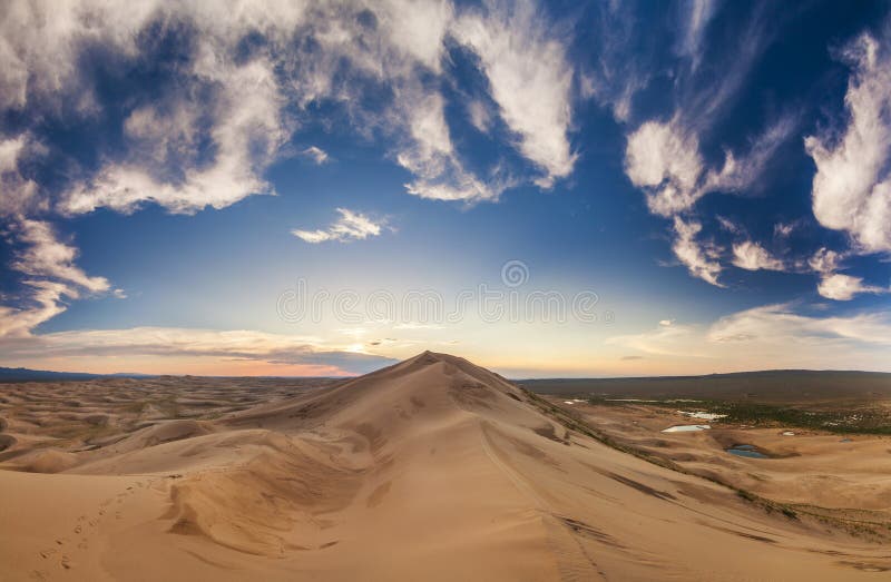 Colorful sunset over the dunes of the Gobi Desert.